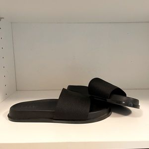 Black slide on sandals